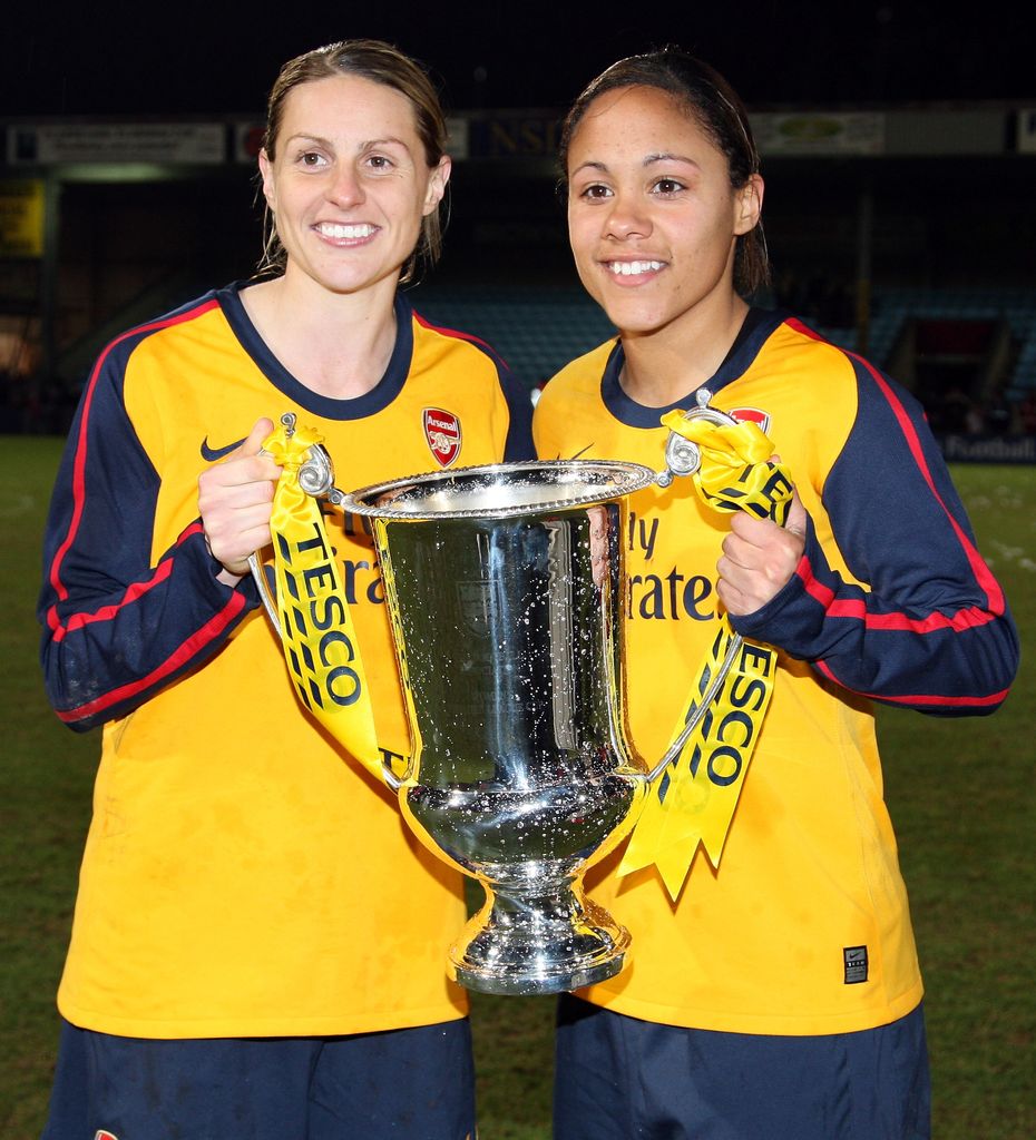 Kelly Smith and Alex Scott holding a trophy
