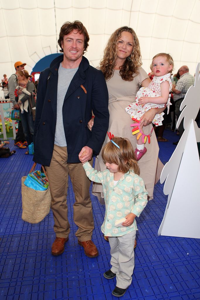 Toby Stephens with wife Anna-Louise and two of their children