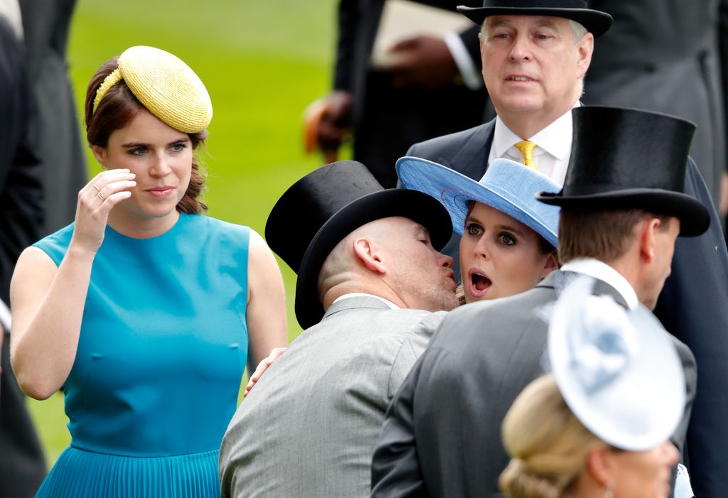 A photo of Mike Tindall kissing Princess Beatrice on the cheek