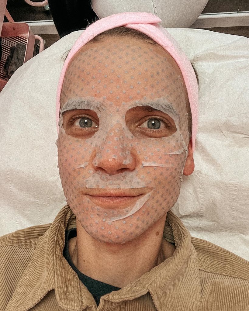 A photo of Joe Sugg wearing a face mask