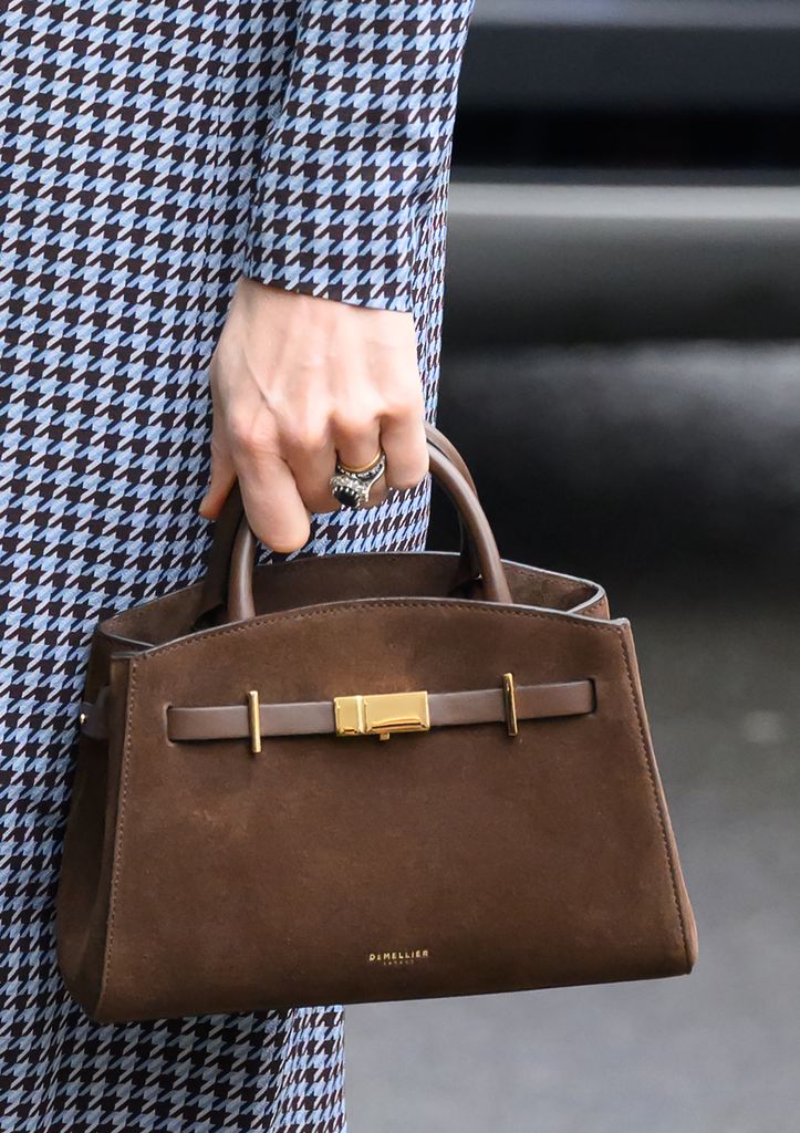 Catherine, Princess of Wales, handbag detail, departs after visiting the children's mental health charity Anna Freud at Anna Freud Centre on November 27, 2025 in London, England. (Photo by Karwai Tang/WireImage)