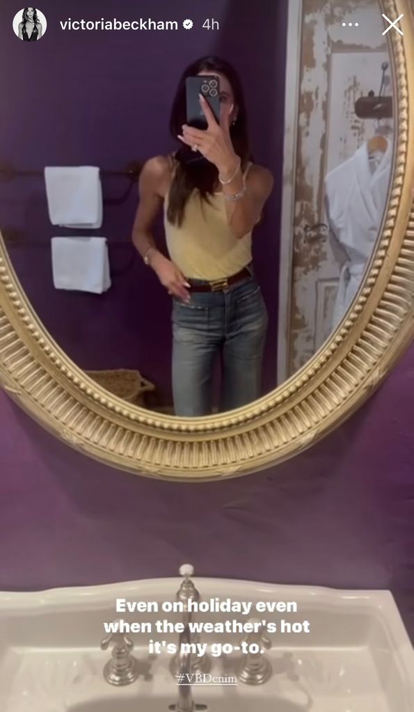 Victoria Beckham wearing her new denim jeans and a yellow vest top