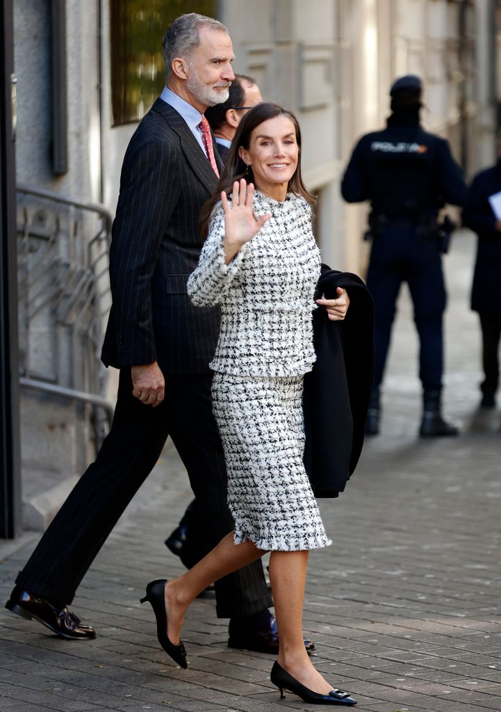 King Felipe and Queen Letizia as they leave the Rey Juan Carlos University on December 2, 2025, in Madrid, Spain