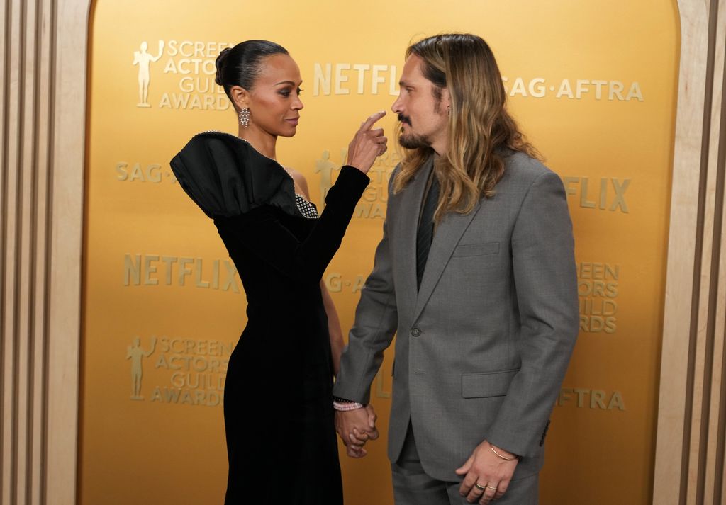 Zoe Saldaña’s husband Marco Perego visibly emotional amid rare dare night at SAG Awards