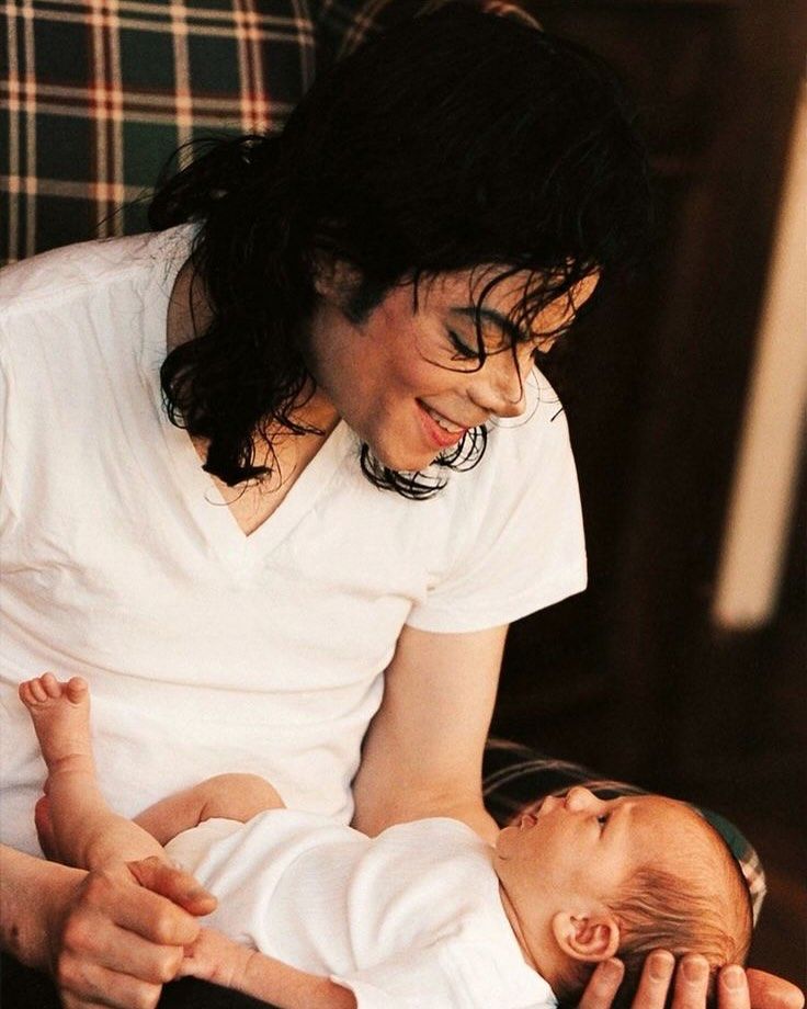 Michael Jackson holds a baby Prince Jackson in a family photo shared on Instagram
