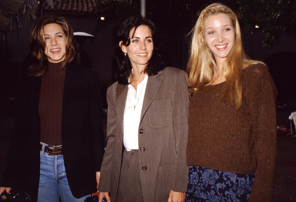 Jennifer Aniston, Courteney Cox and Lisa Kudrow pose for a portrait during an NBC Press Tour Party on January 9, 1995 in Los Angeles, California