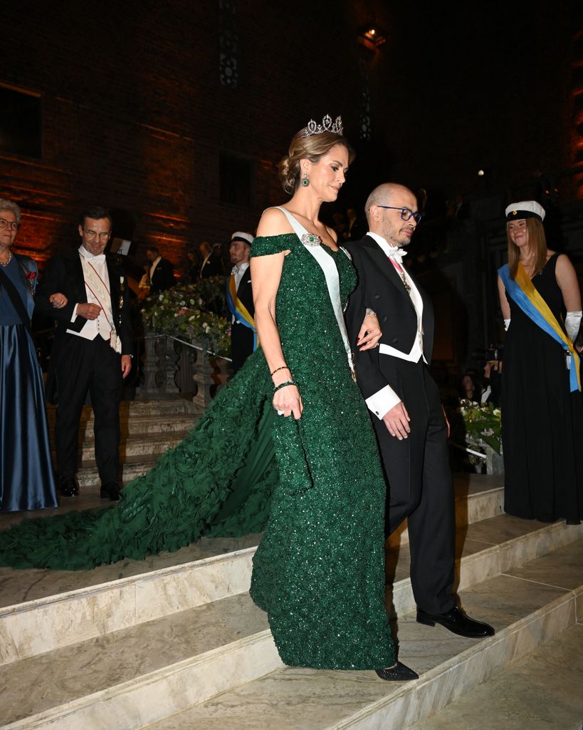 Demis Hassabis and Princess Madeleine descending stairs