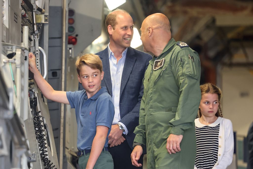 Prince George operating a machine at air show