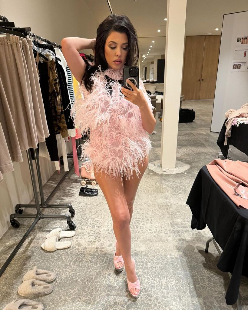 kourtney kardashian pink feathered bodysuit lemme glow lollipops