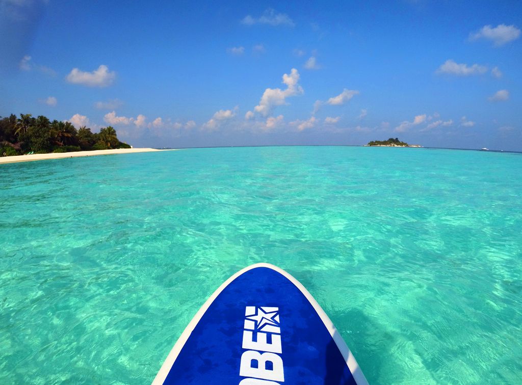 A stunning view of Nova Maldives' beaches from a paddleboard