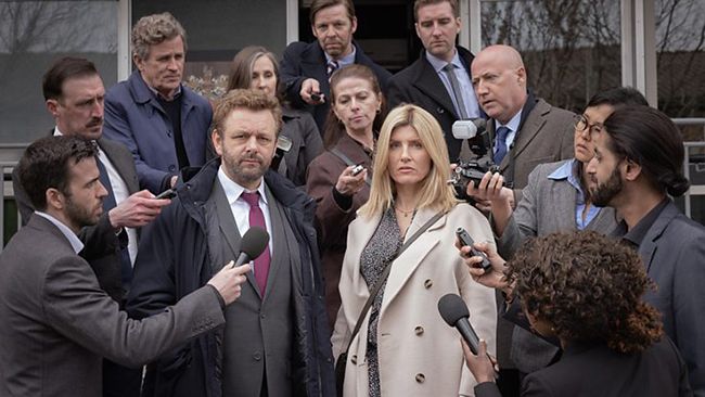 Sharon Horgan and Michael Sheen surrounded by reporters in bbcs Best Interests