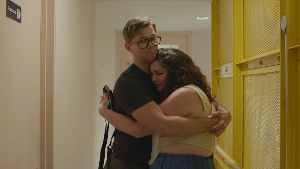 man and woman hugging 