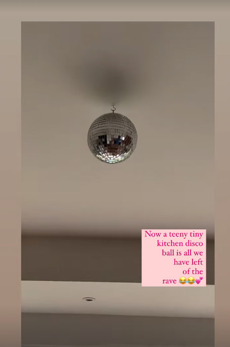 Nina Warhurst's kitchen with disco ball hanging from ceiling