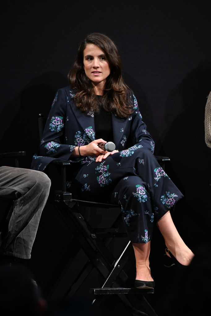 Tatiana Schlossberg in navy floral suit