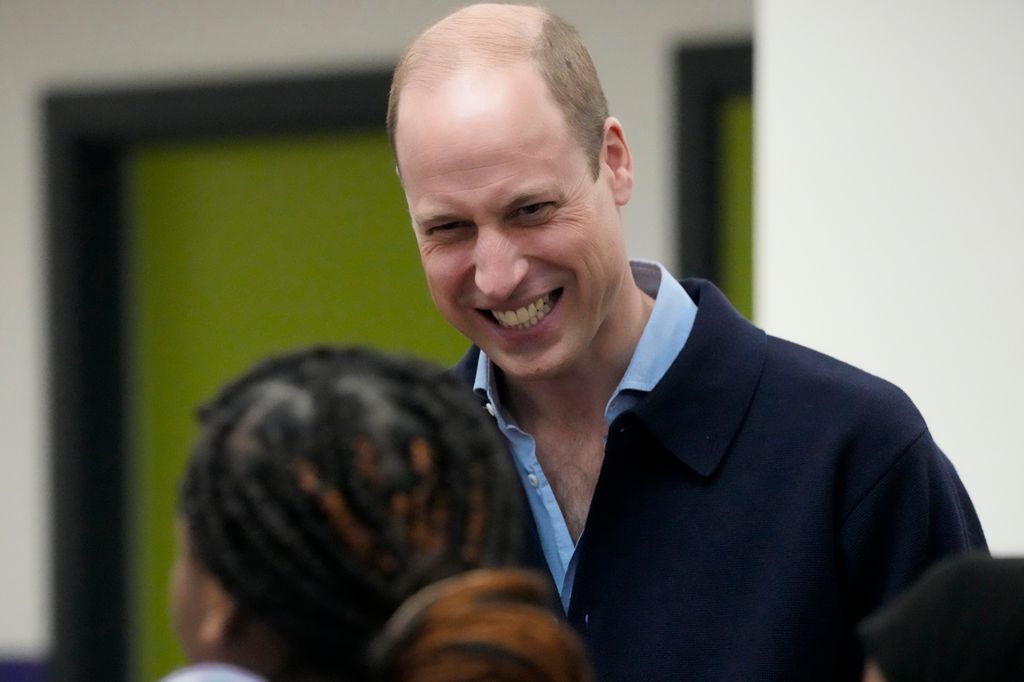 Prince William smiling and laughing