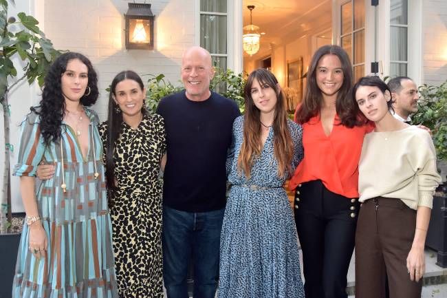 Bruce Willis with Demi Moore and their daughters plus his wife Emma