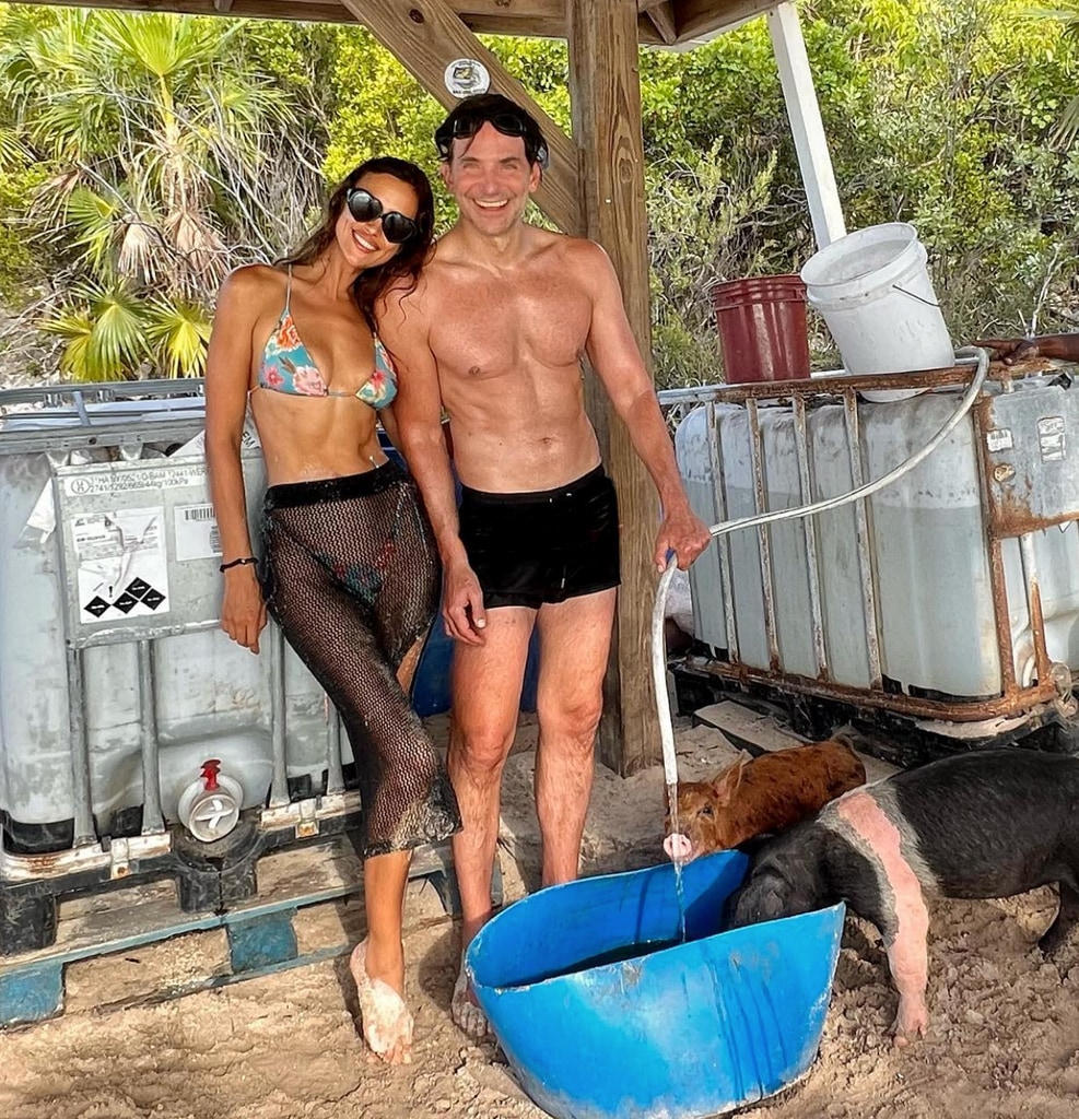 Photo posted by Irina Shaky on Instagram August 2022 posing in a bikini next to ex Bradley Cooper while on vacation, three years after their split