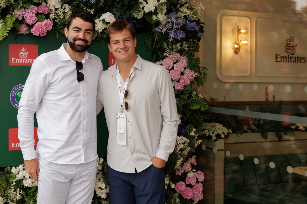 American football player Drake Maye poses with his brother Luke at the Emirates lounge