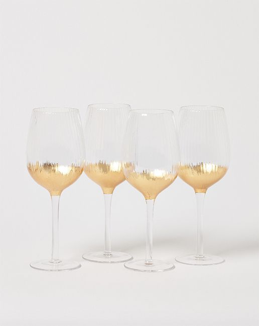 Oliver Bonas gold wine glasses