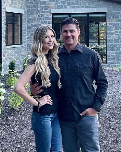 Photo shared by Christina Hall on Instagram June 2023 of a photo with her husband posing outside the Southall Farm & Inn in Franklin, Tennessee