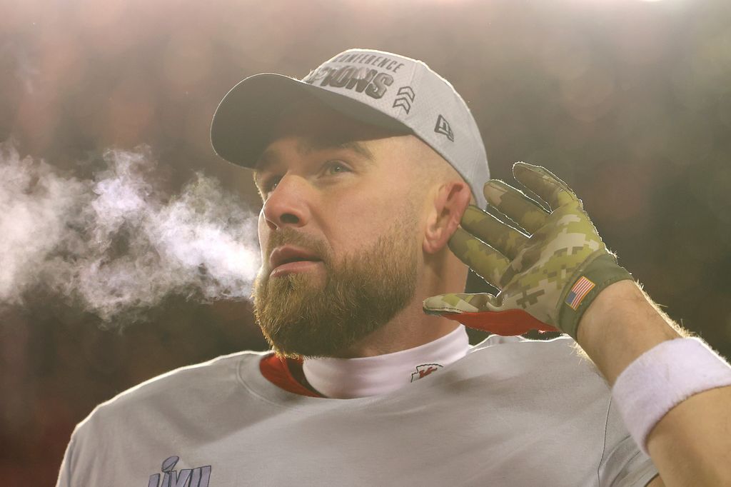 Travis Kelce #87 of the Kansas City Chiefs celebrates after defeating the Cincinnati Bengals 23-20 in the AFC Championship Game at GEHA Field at Arrowhead Stadium on January 29, 2023 