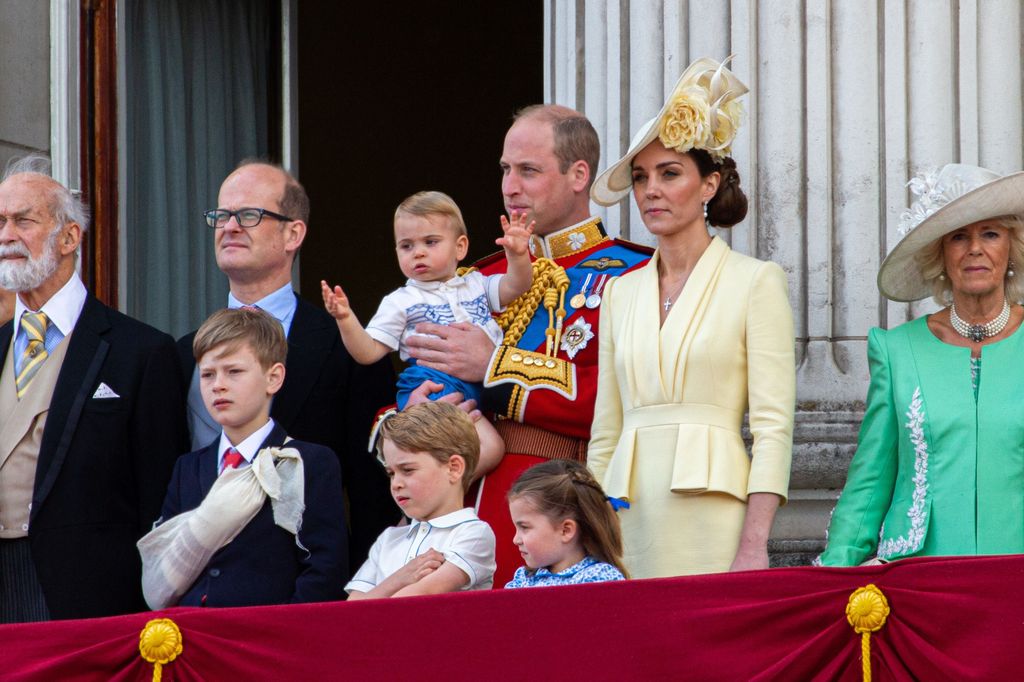 Albert Windsor in a sling with Prince Michael of Kent, Prince George, Prince Louis, Princess Charlotte, Prince William, Princess Kate and Queen Camilla