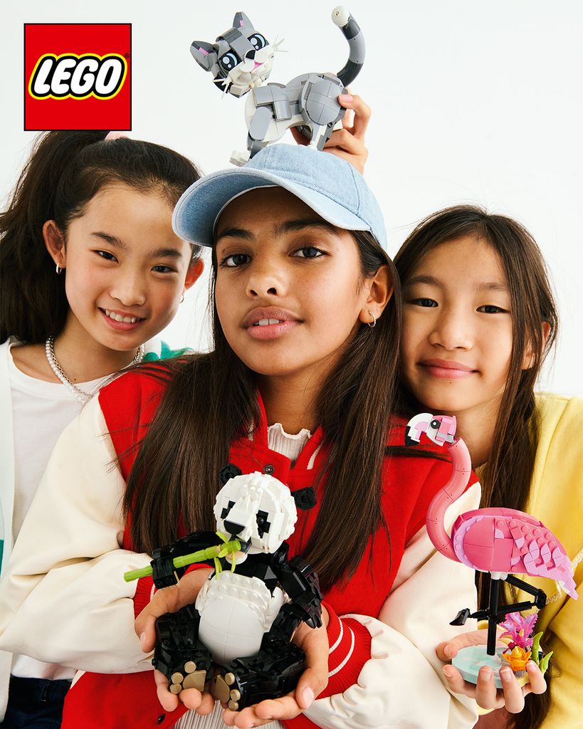 Three girls with LEGO toys