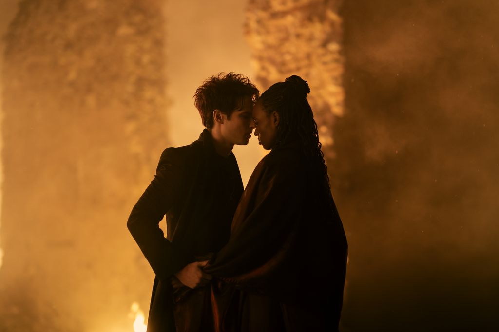 Tom Sturridge as Dream, Umulisa Gahiga as Nada in The Sandman