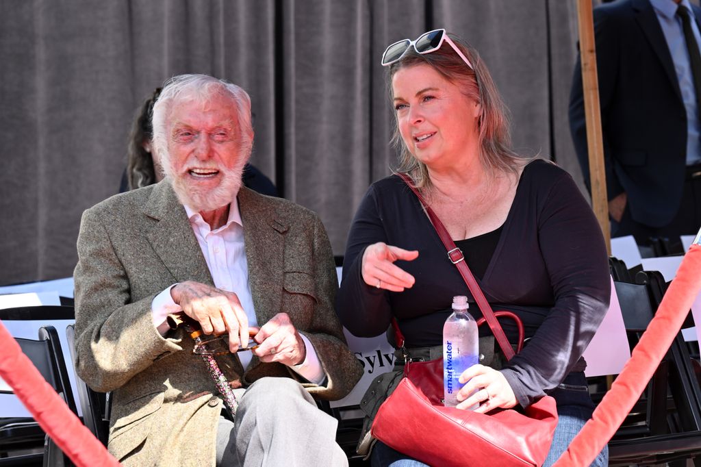 Dick Van Dyke and Arlene Silver smiling handprint ceremony