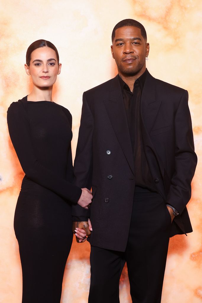 Lola Abecassis Sartore and Kid Cudi attend the Saint Laurent Womenswear Fall/Winter