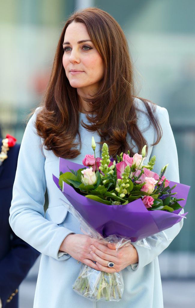 Princess Kate wearing a baby blue coat crafte by materninty label Seraphine