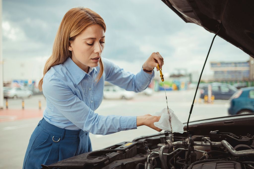 Checking the level of oil on an engine dipstick is one of the simplest car DIY jobs