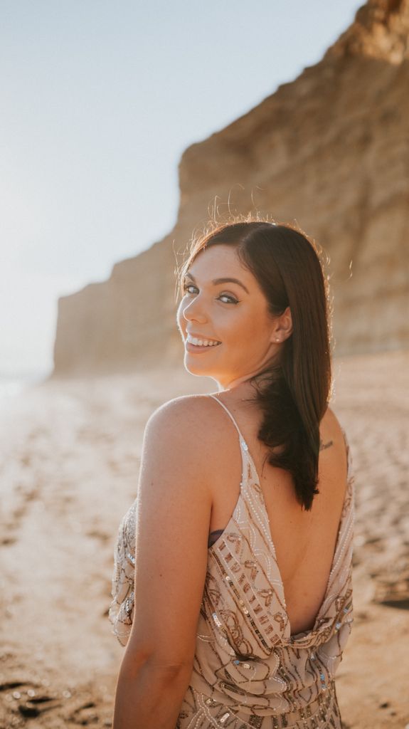 Emma on a beach