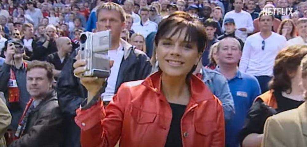 Victoria Beckham wearing the coolest red leather jacket