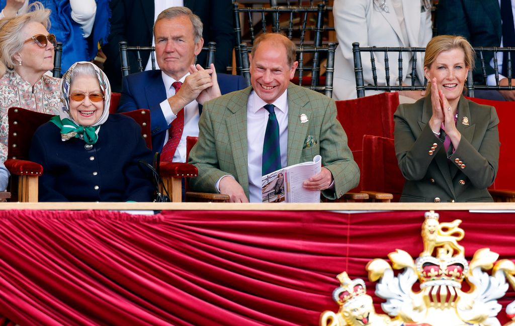 Queen Elizabeth II, Prince Edward and Duchess Sophie clapping at the Windsor Horse Trials in 2022