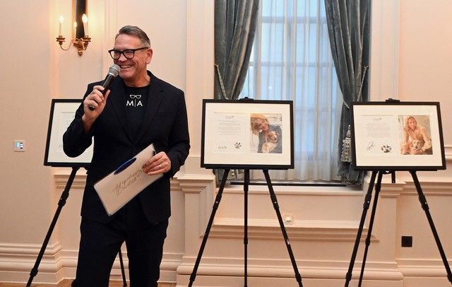 The event curator Mark Aldridge, who adopted his cat Harvey from Celia Hammond