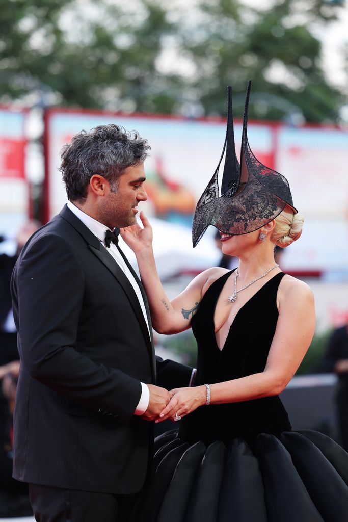 Michael Polansky and Lady Gaga attend the "Joker: Folie Ã  Deux" red carpet during the 81st Venice International Film Festival at Sala Grande on September 04, 2024 in Venice, Italy. (Photo by Ernesto Ruscio/Getty Images)