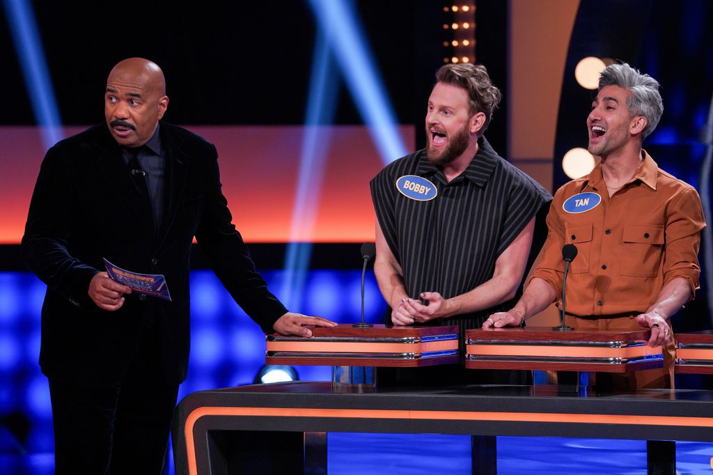 Tan France and Bobby Berk appear on Celebrity Family Feud