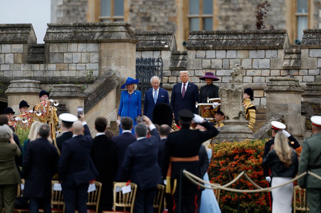 U.S. President Donald Trump and First Lady Melania Trump attend a Beating Retreat ceremony with King Charles III and Queen Camilla on the east lawn of Windsor Castle during a state visit on September 17, 2025