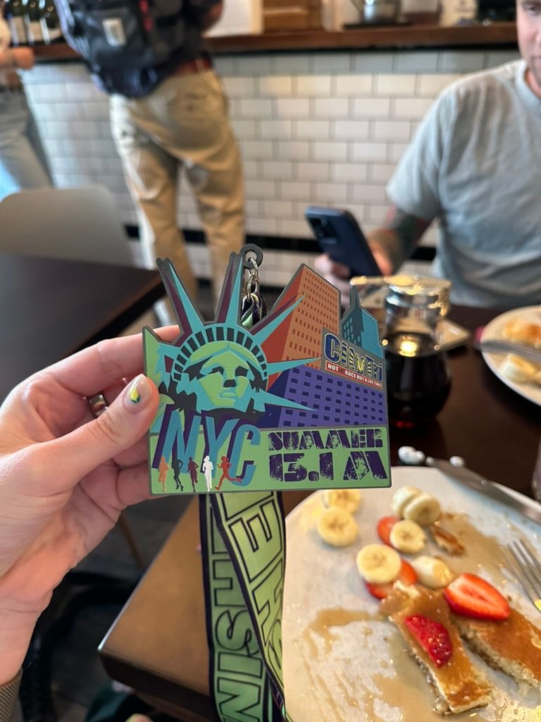 Tess's medal from the race