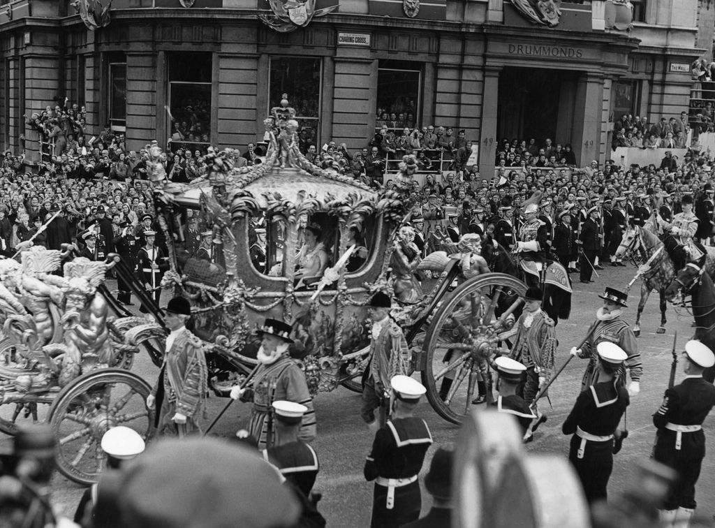 The late Queen travelling in the Gold State Coach at her 1953 coronation