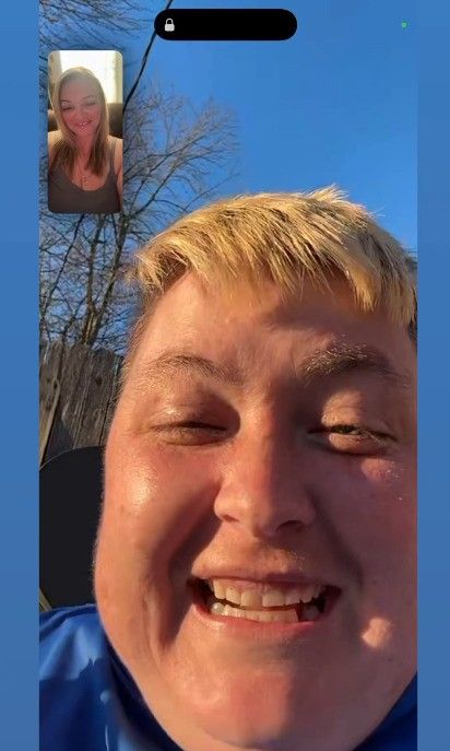 photo of katie slaton on a video call with cousin amanda