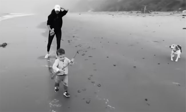 Archie Harrison runs on the beach