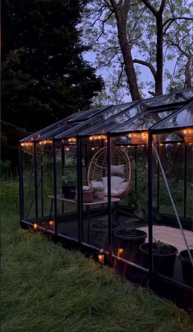 Stacey Solomon's greenhouse transformation at night with festoon lighting