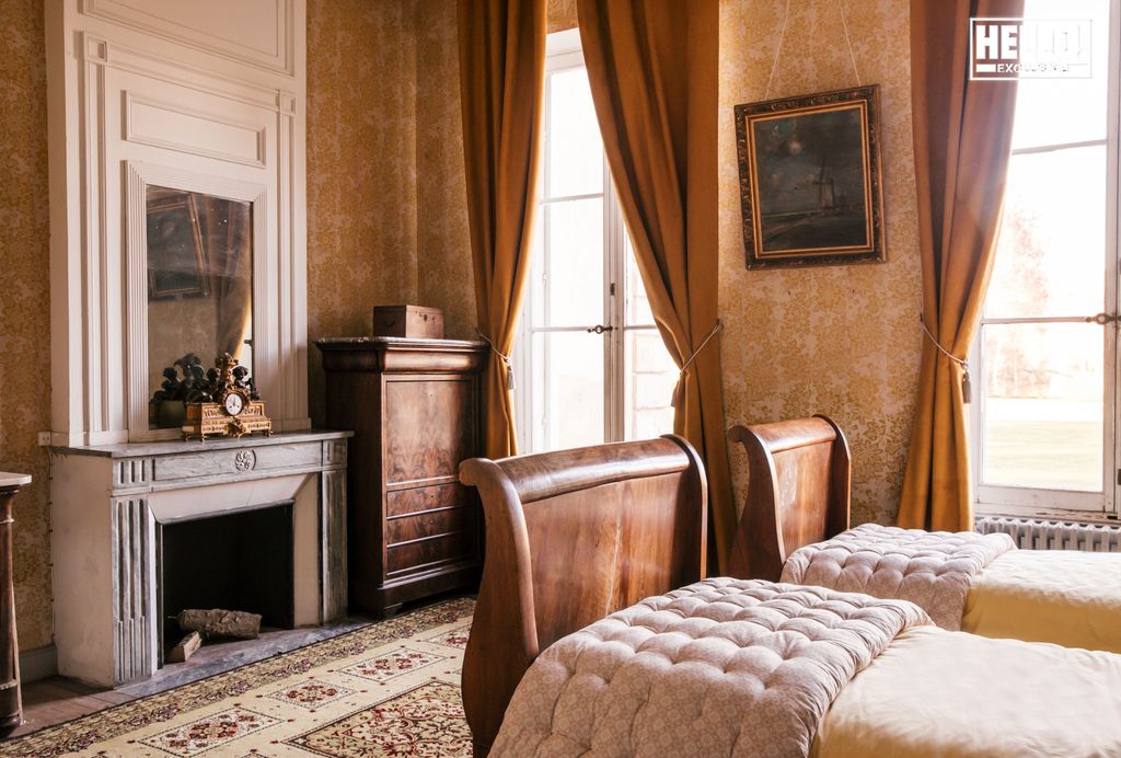 Baron Arnaud De Bastard's ochre bedroom at Chateau de Saint-Denis