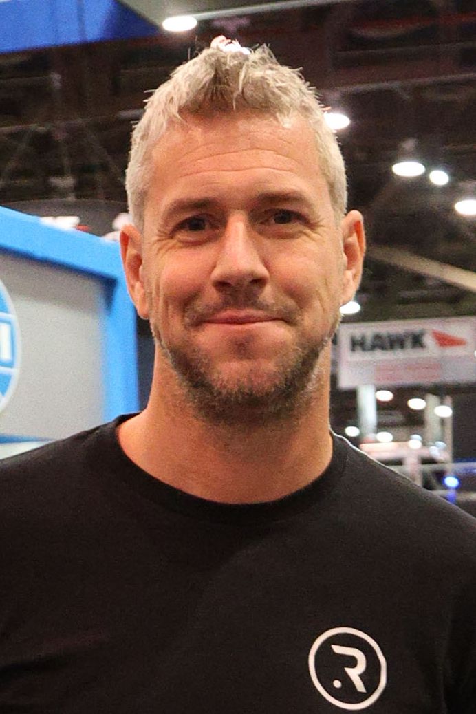 Ant Anstead smiling at a car show 