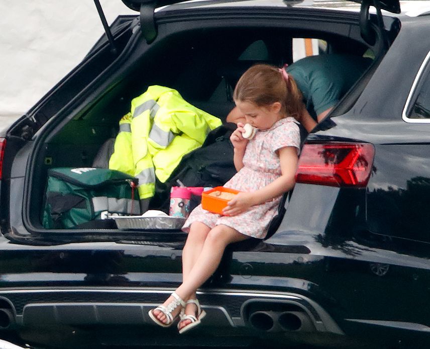 Princess Charlotte eating in boot of car