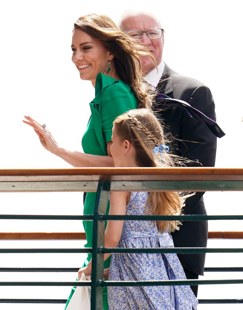 Princess Charlotte with a blue ribbon in her hair