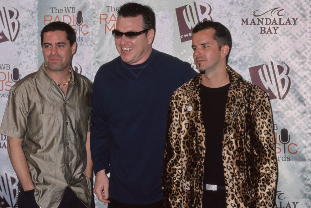 Steve Harwell with Smash Mouth members