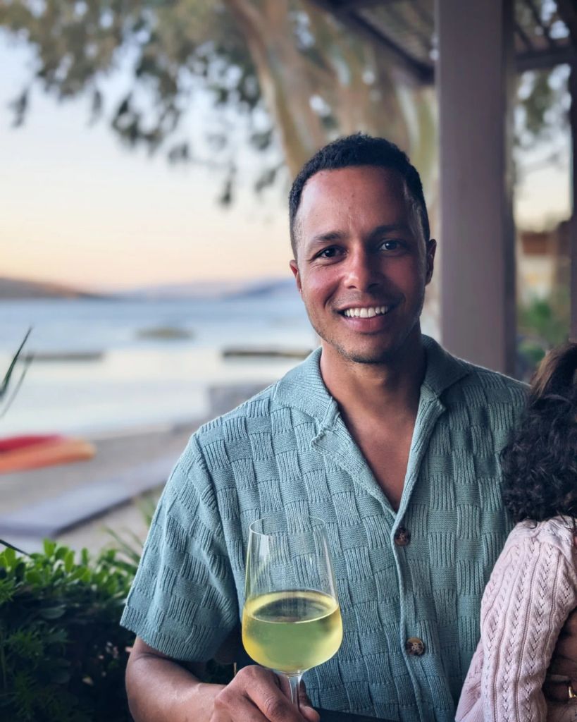 man on holiday with daughter 